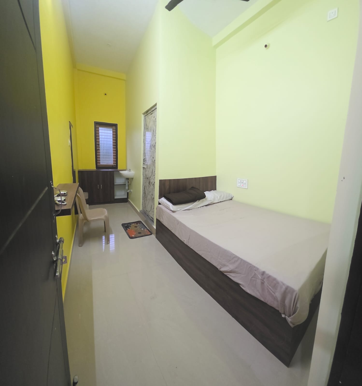 Budget Room Interior at Family Comfort Residency